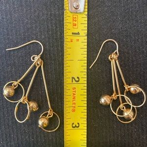 Gold tone dangle earrings